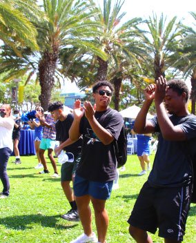 students dancing outside